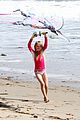 heidi klum beach handstands with leni 17